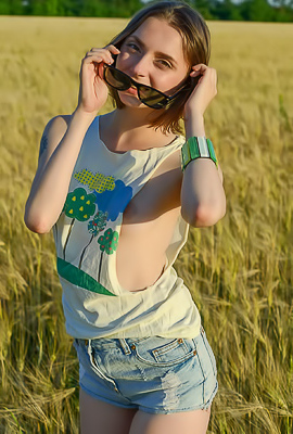 Zhy Zhy Spreads Legs In Sheer Camisole Outdoors For Steamy Striptease